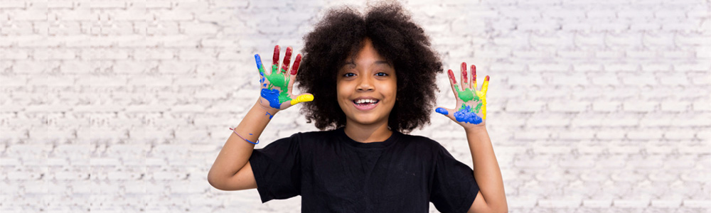 Child with painted hands